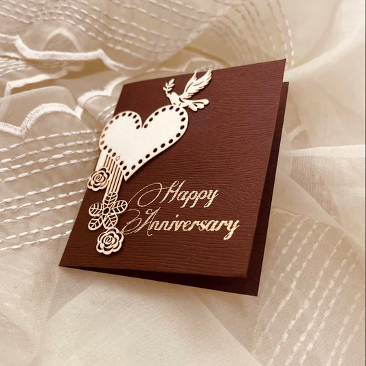 brown coloured anniversary gift tags with heart, birds and floral designs on it