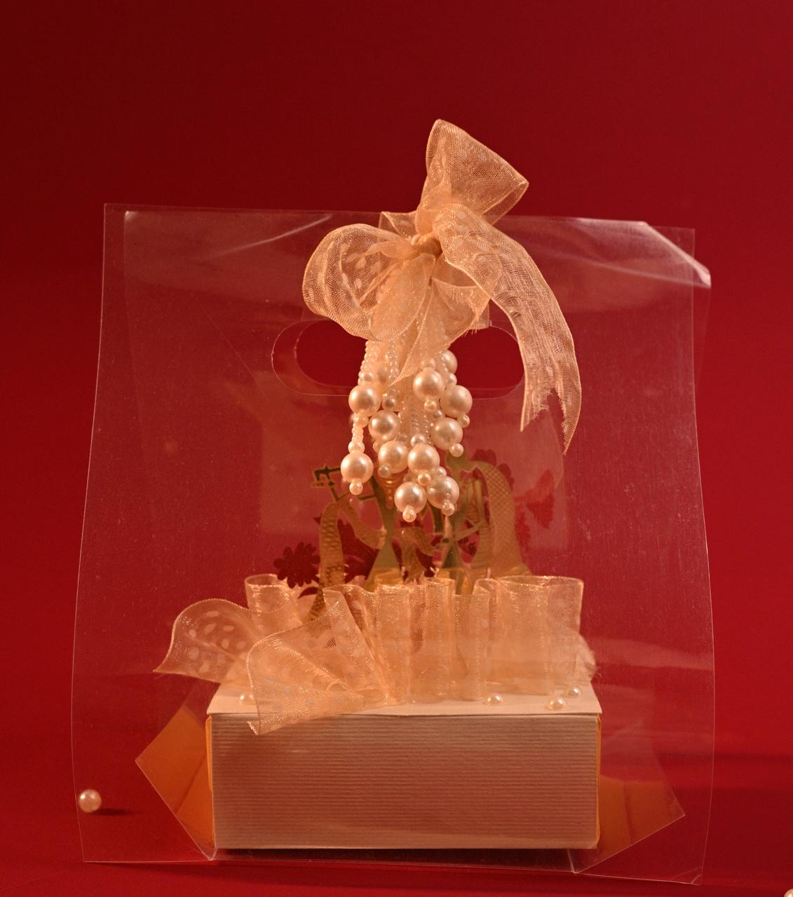 Standing 3D Design: Includes a centerpiece of Radha and Krishna, accompanied by floral motifs.