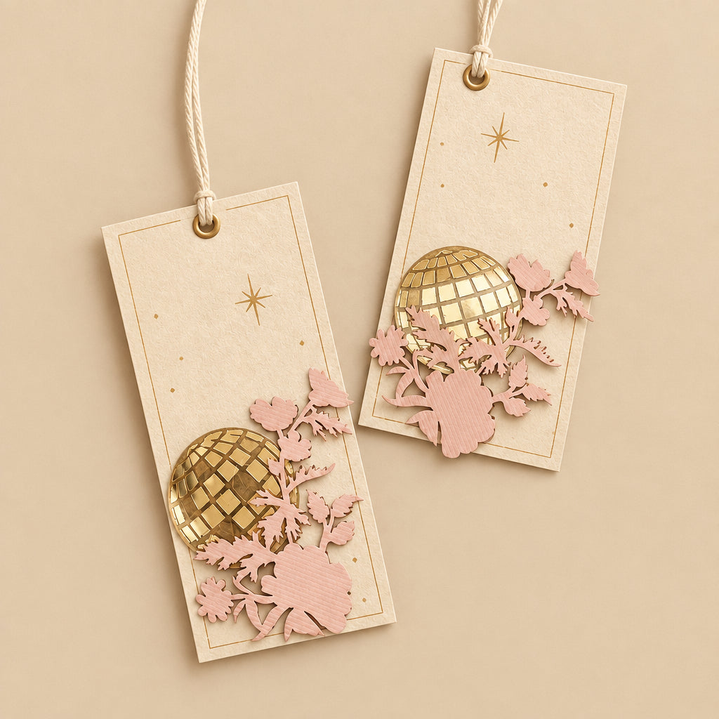 brown gift tags with laser-cut detailing, featuring floral designs and an acrylic disco ball