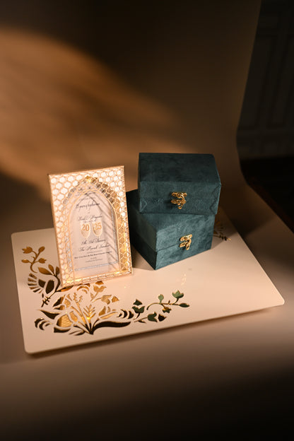 Decorative box with intricate design and a personalised celebratory card