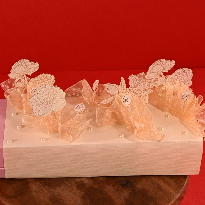 3D design cash box or jewellery box decorated with standing flower and transparent bag.