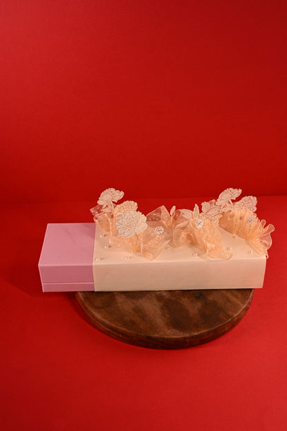 3D design cash box or jewellery box decorated with standing flower and transparent bag.