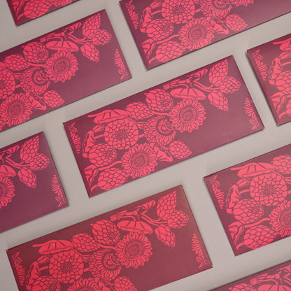  Deep maroon with vibrant floral motifs inspired by dahlias and sunflowers