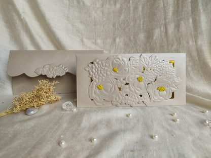 Silver ambrosia sagun envelope with flower embossing and cutting