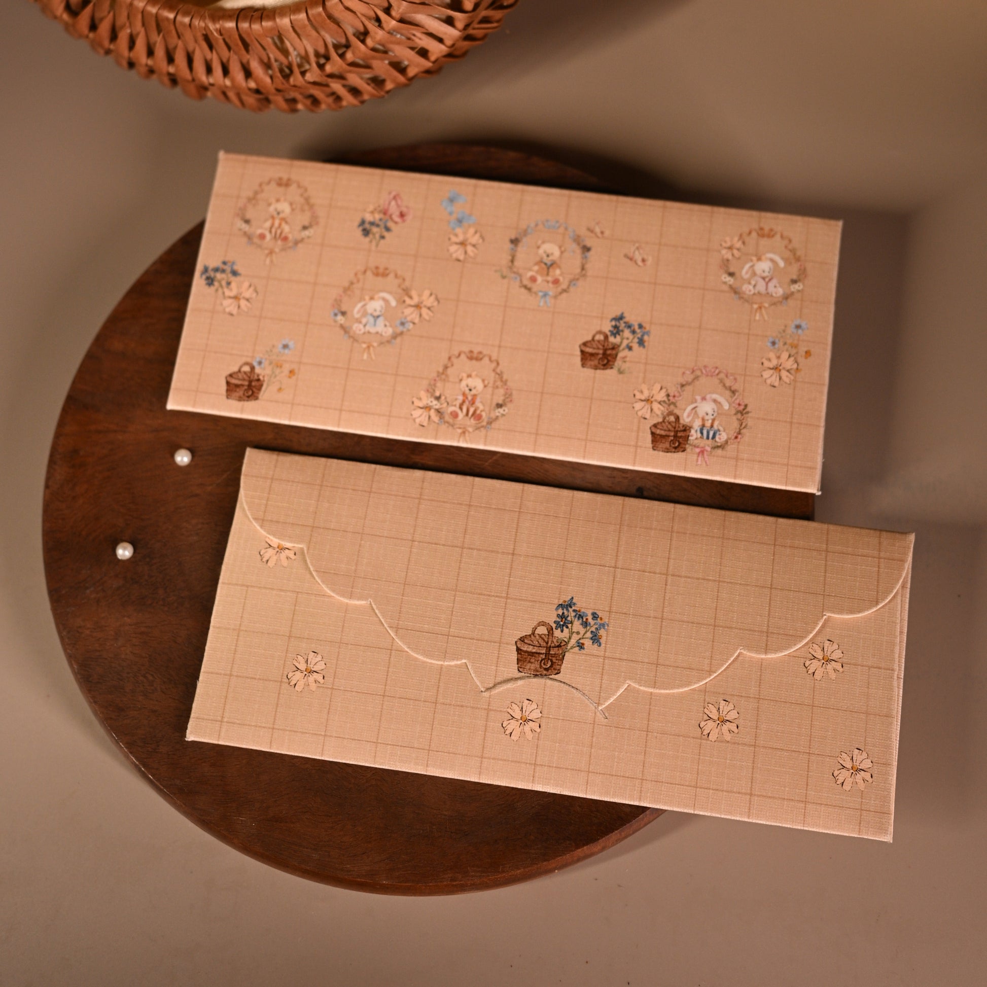 Light brown envelope with baby bears and baskets of flowers for kids