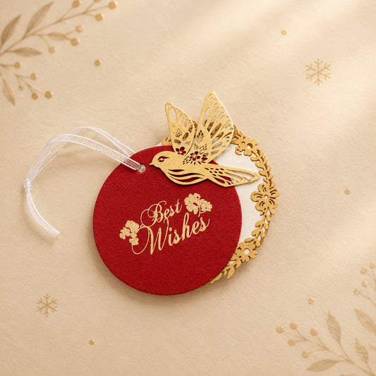 Layered red gift tags with gold 'Best Wishes' text and gold bird cut-outs, in laser cut detailing