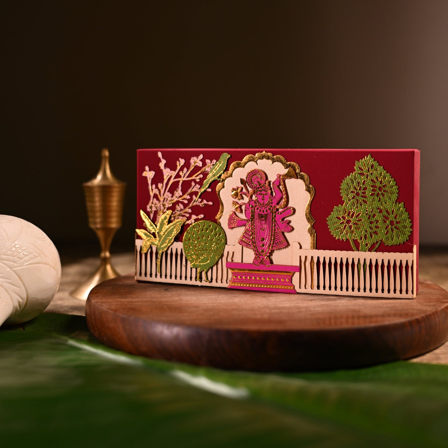 Red cash box, with gold tanjore like wok with foil and lazer cutting  