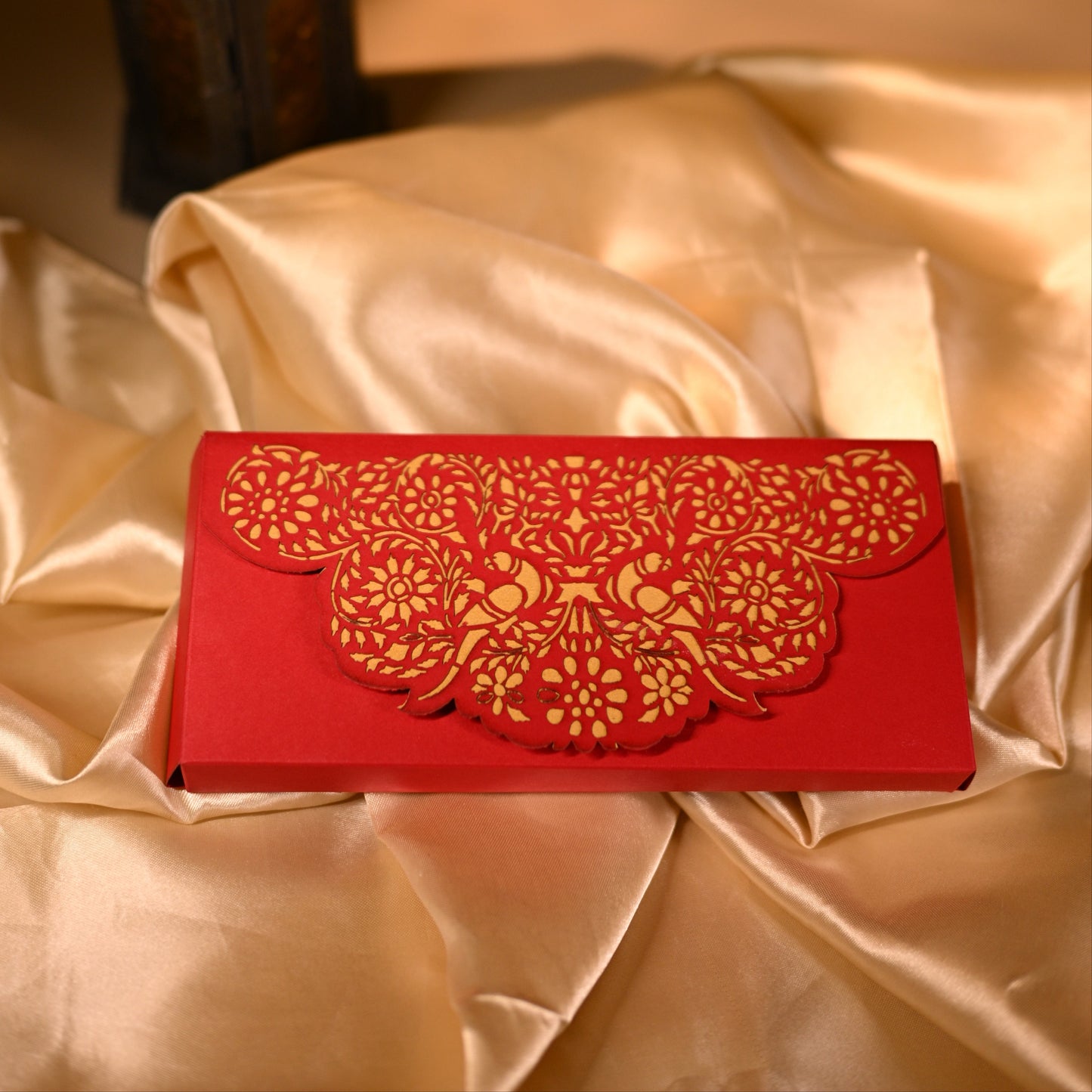 Red envelope with gold floral and bird patterns 