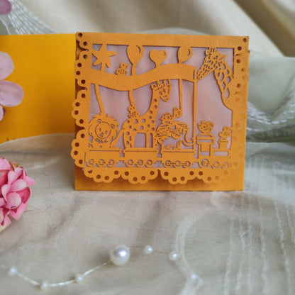 A collection of colourful laser cut envelopes with a design featuring animals