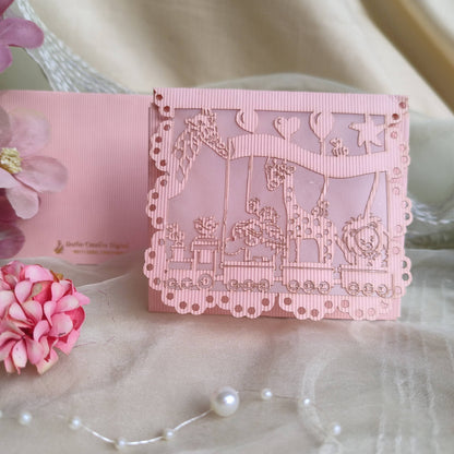 A collection of colourful laser cut envelopes with a design featuring animals