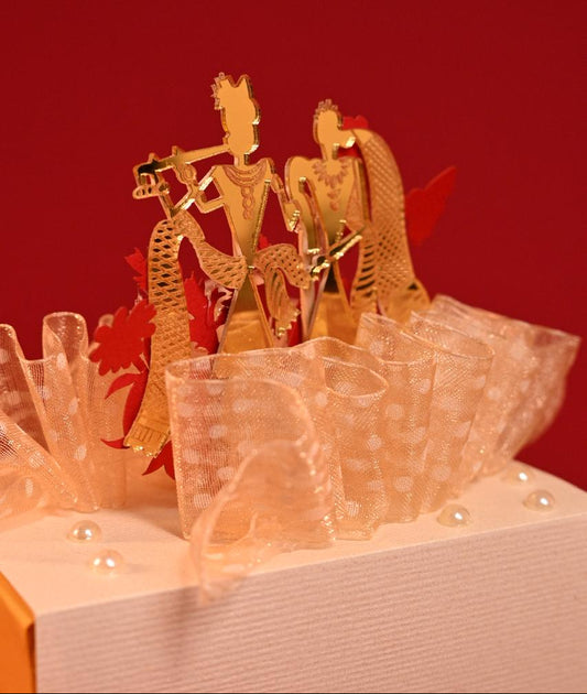 Standing 3D Design: Includes a centerpiece of Radha and Krishna, accompanied by floral motifs.