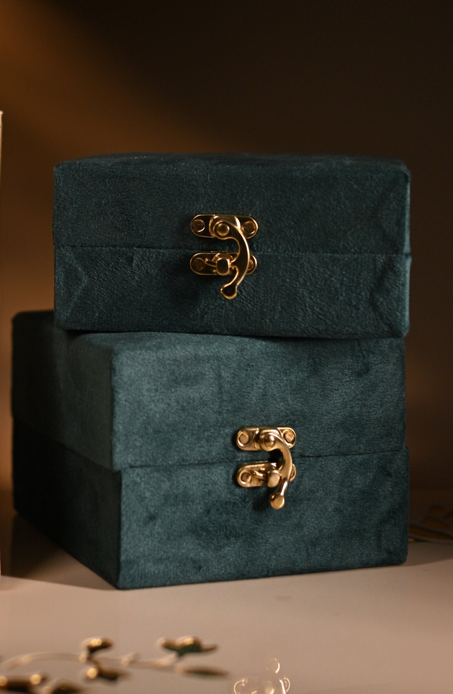 Beautiful emerald coloured decorative box with intricate design.