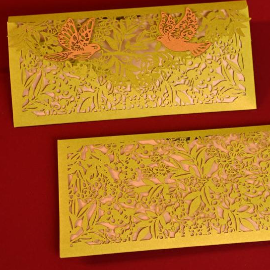 Sagun Envelope Orange Rust colour, with golden inner, and pair of birds on its flap