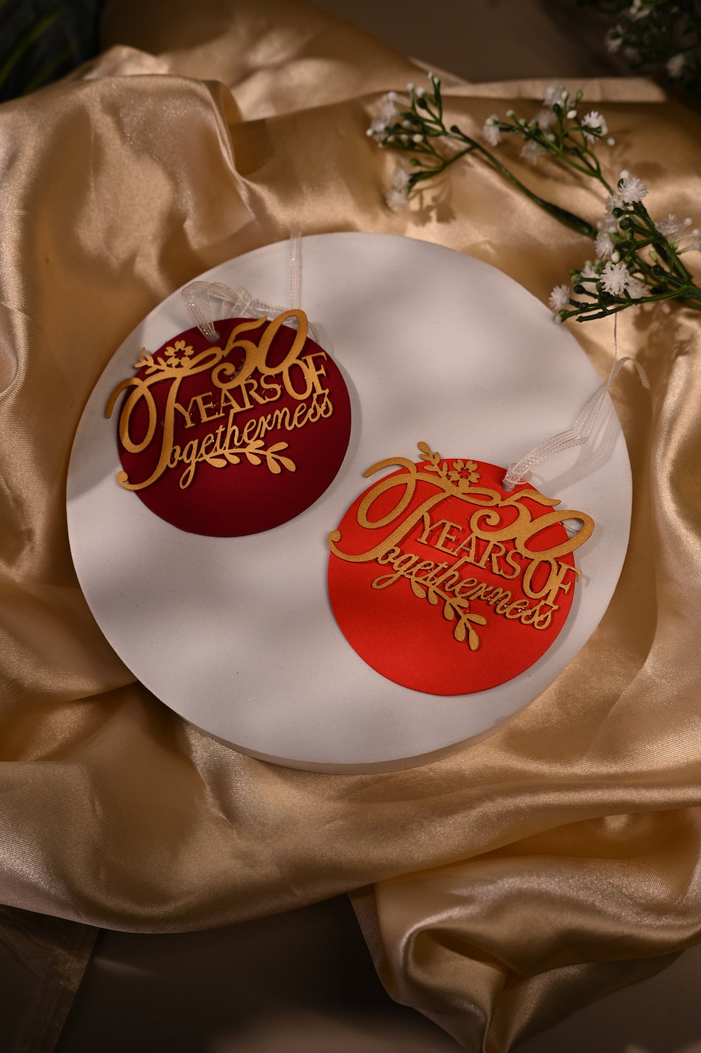 Circular anniversary gift tags with delicatge laser cut writing