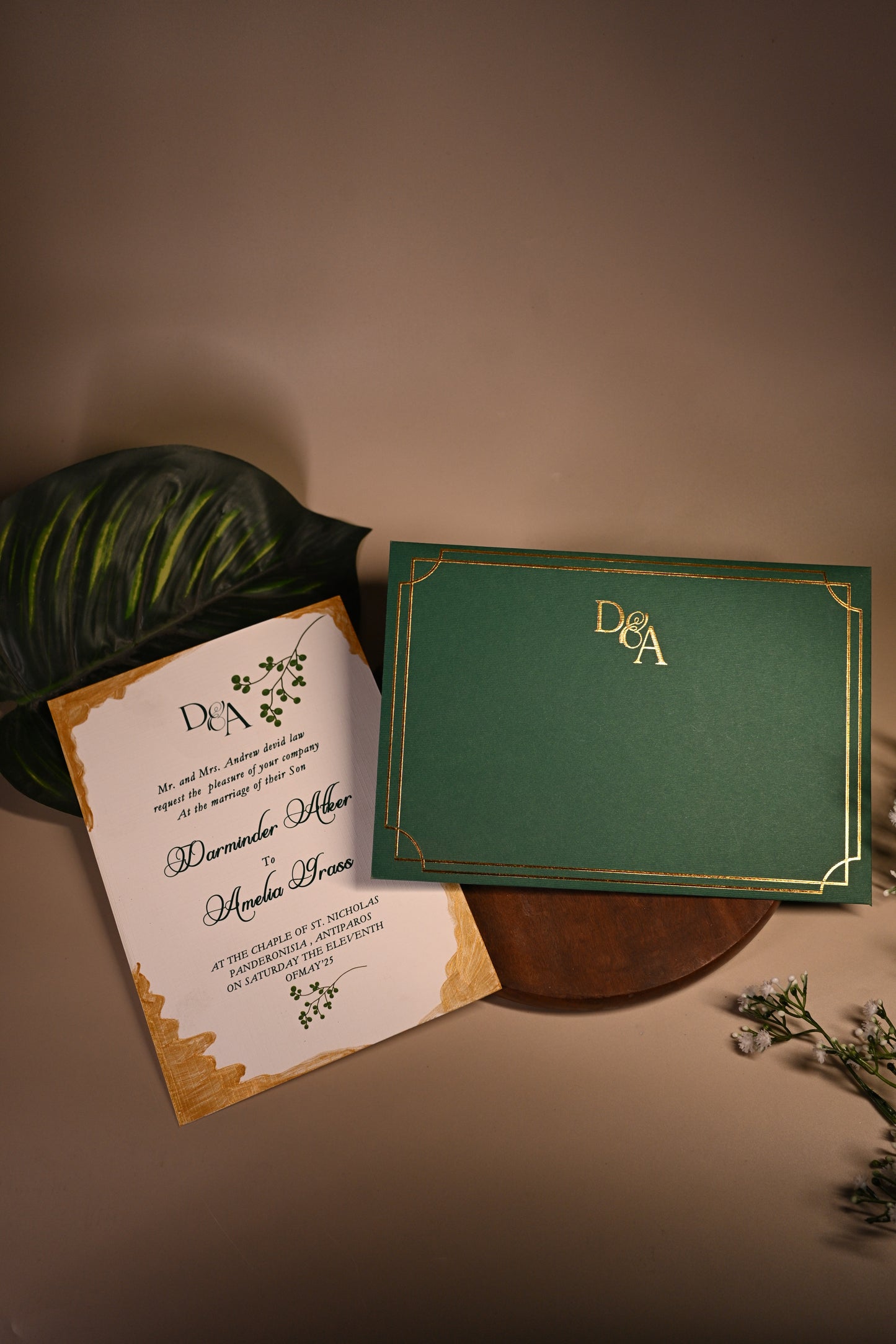 Green invitation card with gold embossing