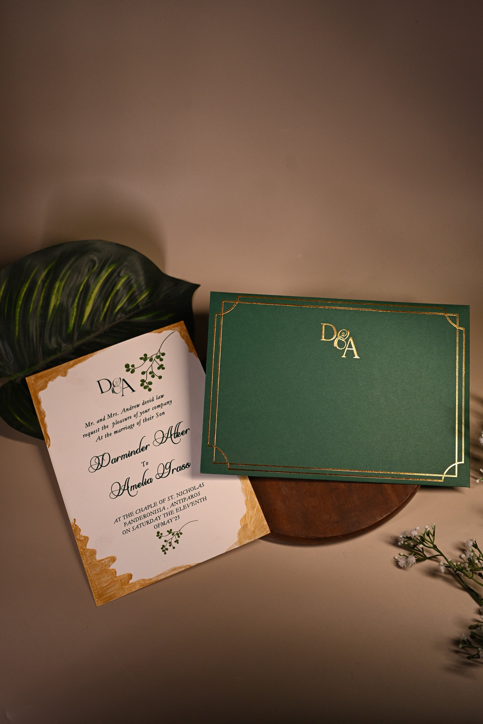 Green invitation card with gold embossing