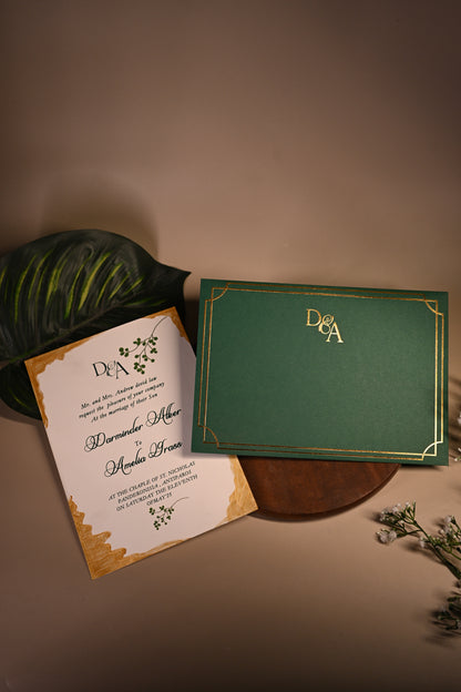 Green invitation card with gold embossing