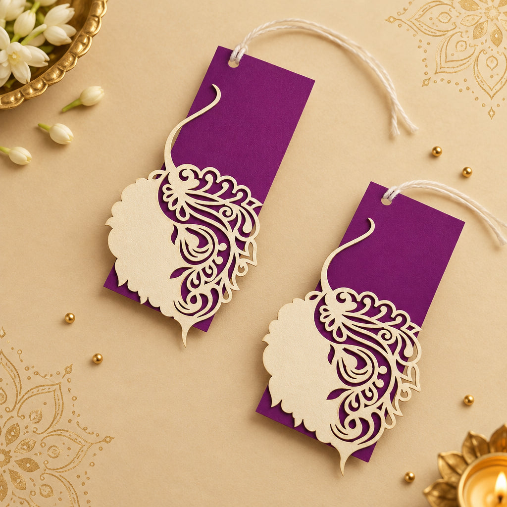Laser-cut gift tags with a Pipal leaf design, in purple and white colours