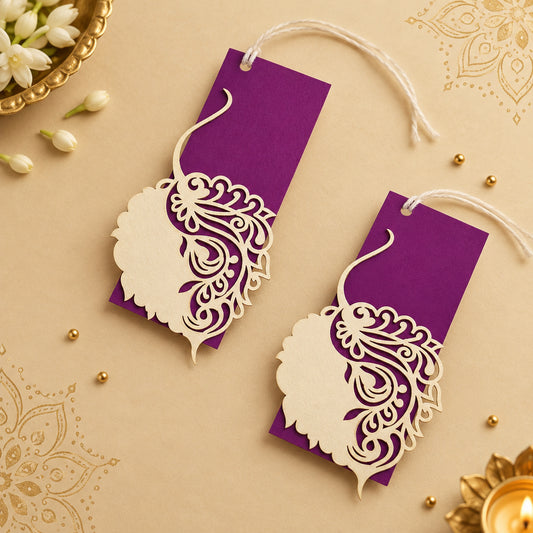 Laser-cut gift tags with a Pipal leaf design, in purple and white colours