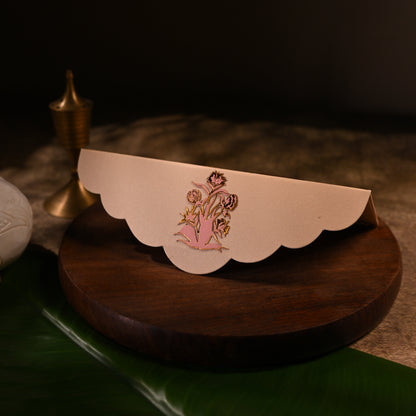 envelope featuring intricate aser cut design and shree nathji