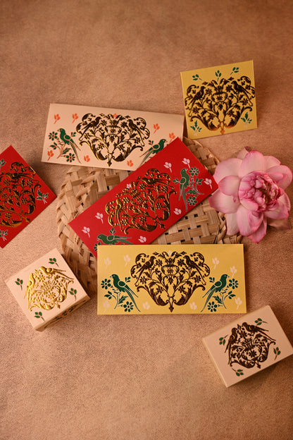 Decorative envelopes and coin box sets with traditional designs and gold foil embossing 