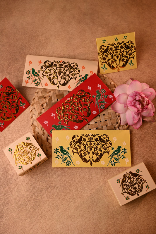 Decorative envelopes and coin box sets with traditional designs and gold foil embossing 