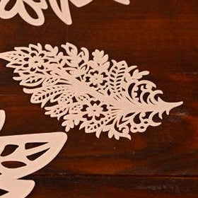 Pearl Acrylic table mat in leaf shape done with laser-cutwork