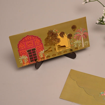 Envelope with a colorful printed design of a red house and Indian Pichwai themetheme