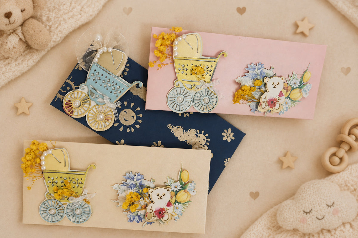 3 colours envelopes with a teddy and pram design, adorned with real flowers