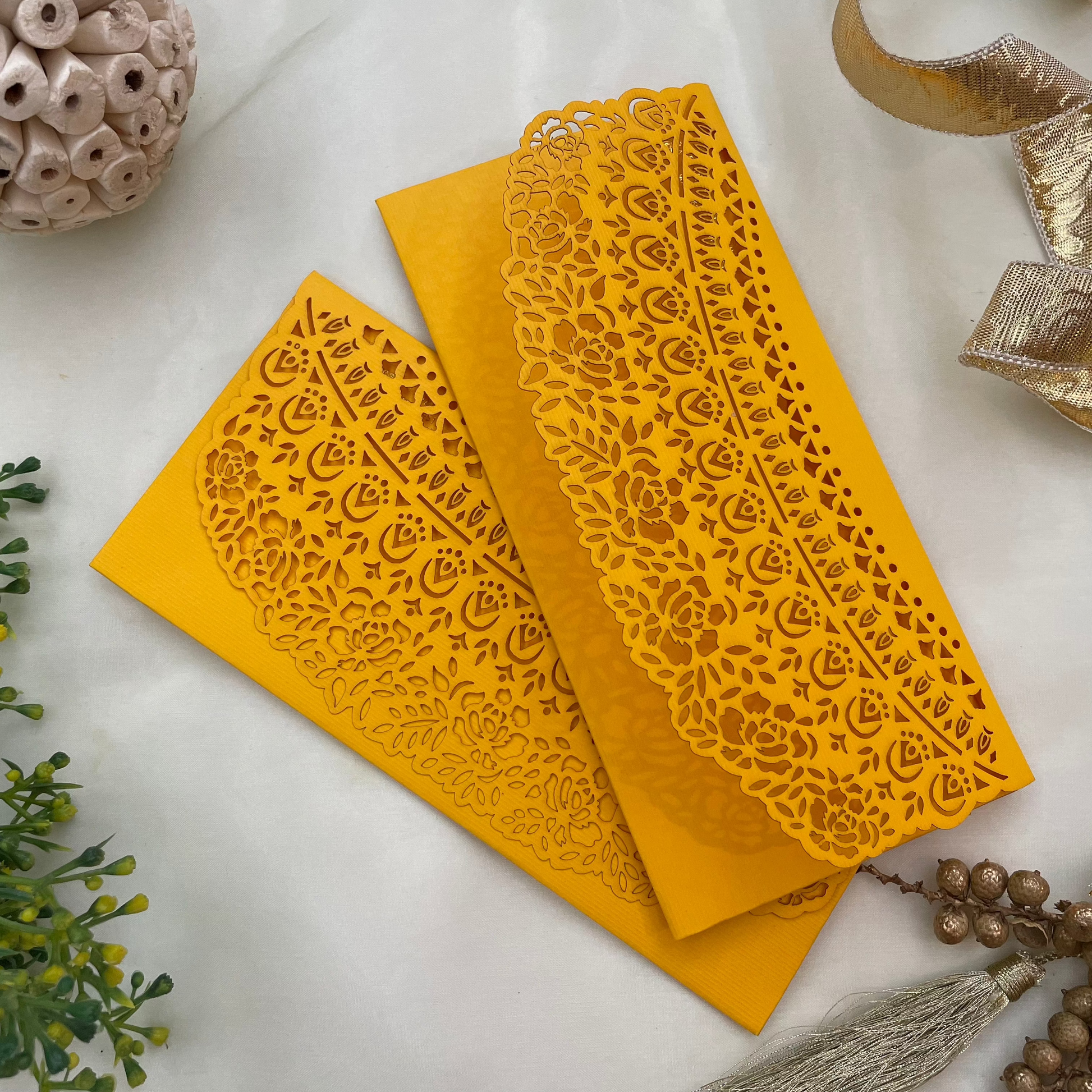 Rose Flap Yellow laser-cut envelopes with intricate Rose pattern.