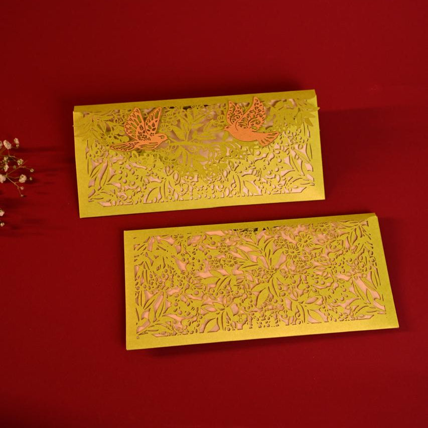 Sagun Envelope Orange Rust colour, with golden inner, and pair of birds on its flap