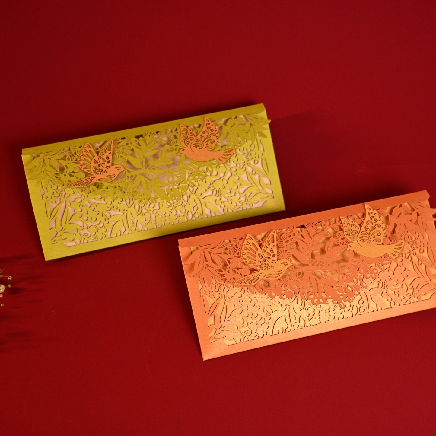 Sagun Envelope Orange Rust colour, with golden inner, and pair of birds on its flap