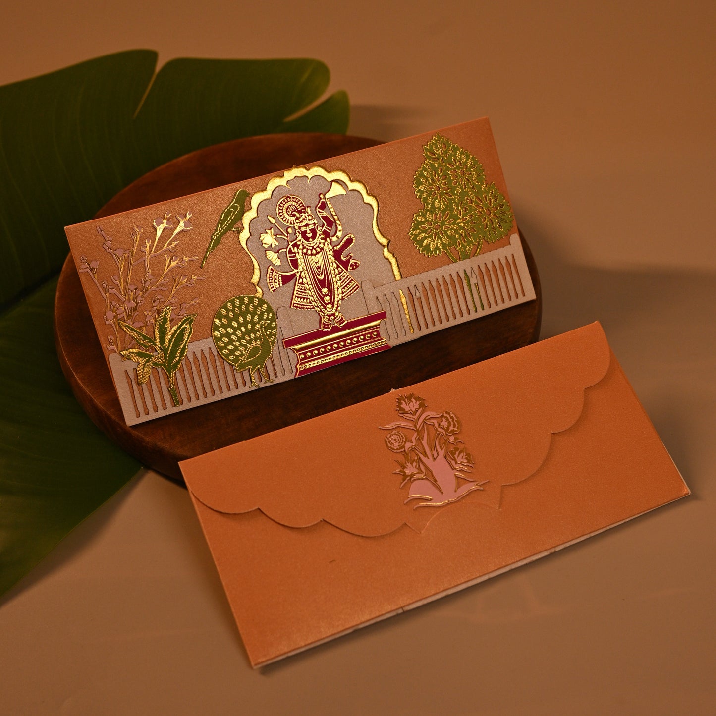 Tanjore Shrinathji Sagun Envelope with the elements of peacock, Banana, tree, Parrot