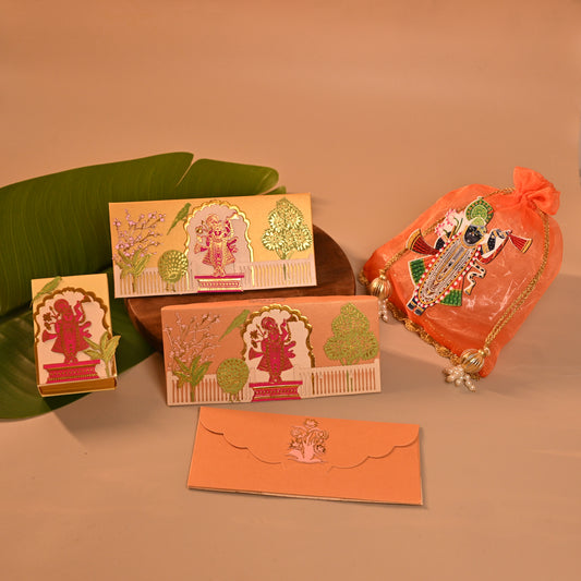 Set of decorative Envelope, coin boxes and an orange pouch with intricate designs, the theme is Pitchwai, tanjore and Srinathji
