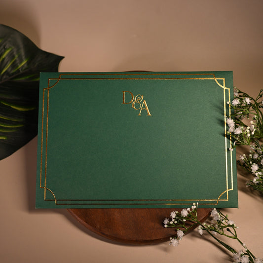 Green invitation card with gold embossing