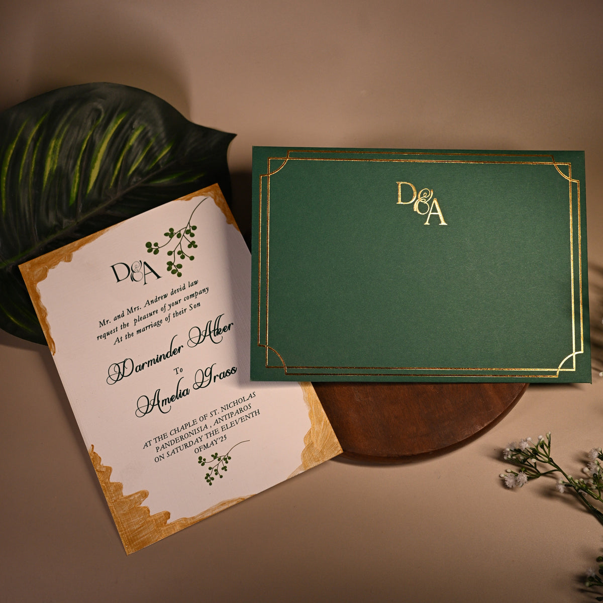 Green invitation card with gold embossing