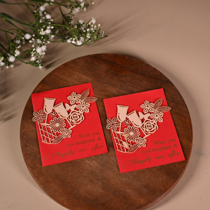 red gift tags with floral laser-cut patchwork and drinking glasses