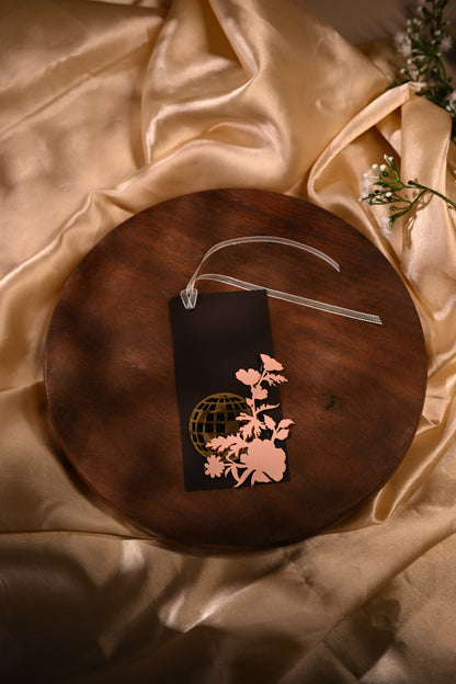 brown gift tags with laser-cut detailing, featuring floral designs and an acrylic disco ball