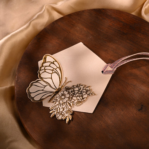 gold fol embossed butterfly ift tags on a white pentagon base