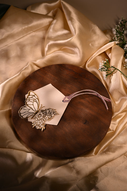 gold fol embossed butterfly ift tags on a white pentagon base