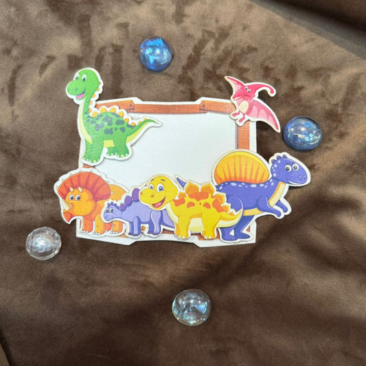 Colorful dinosaurs on a white gift tag for kids