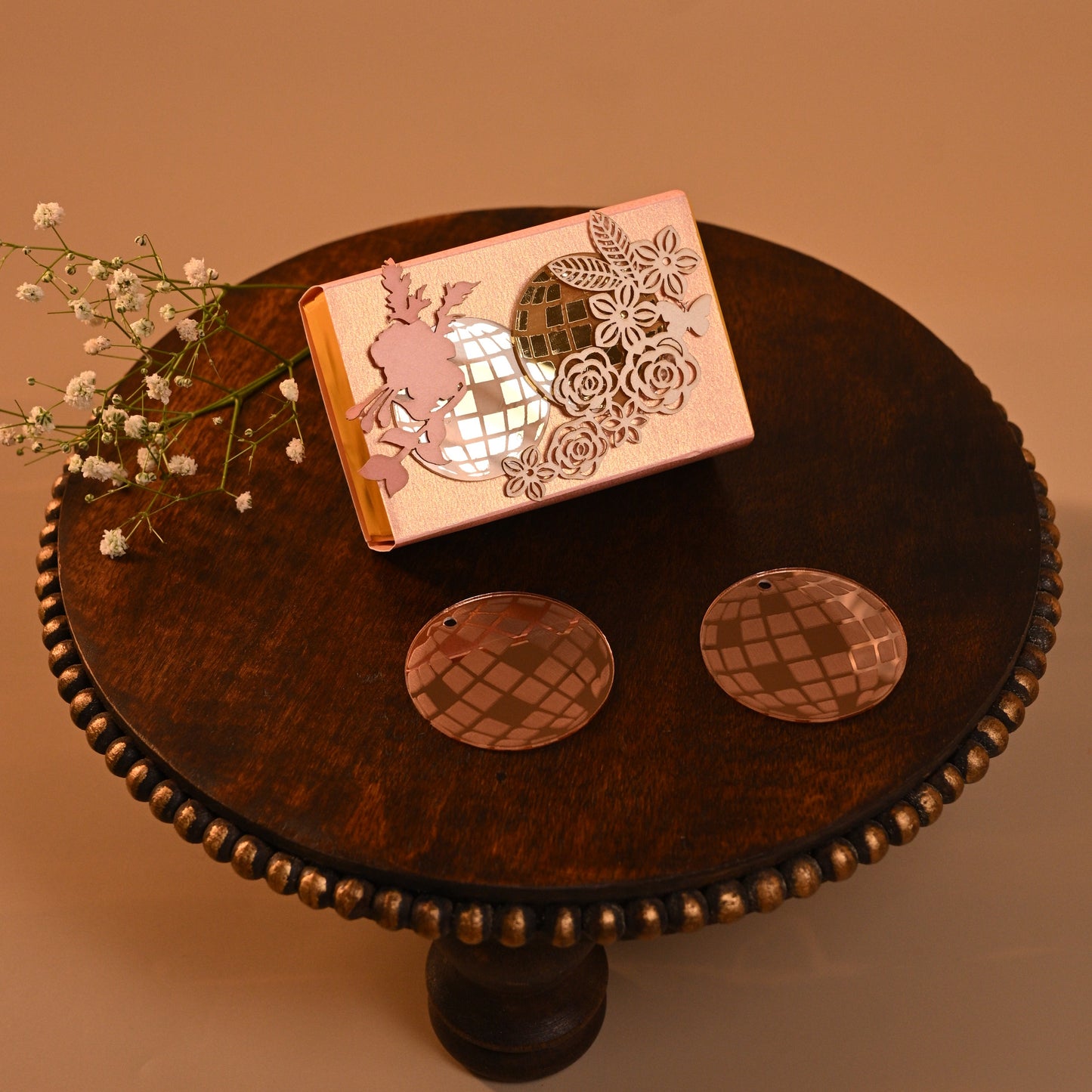 retro themed coin box with acrylic disco balls and floral detailing