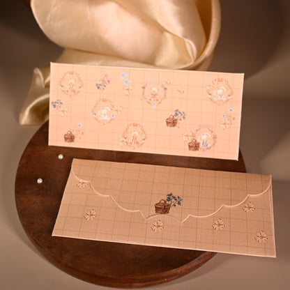 Light brown envelope with baby bears and baskets of flowers for kids