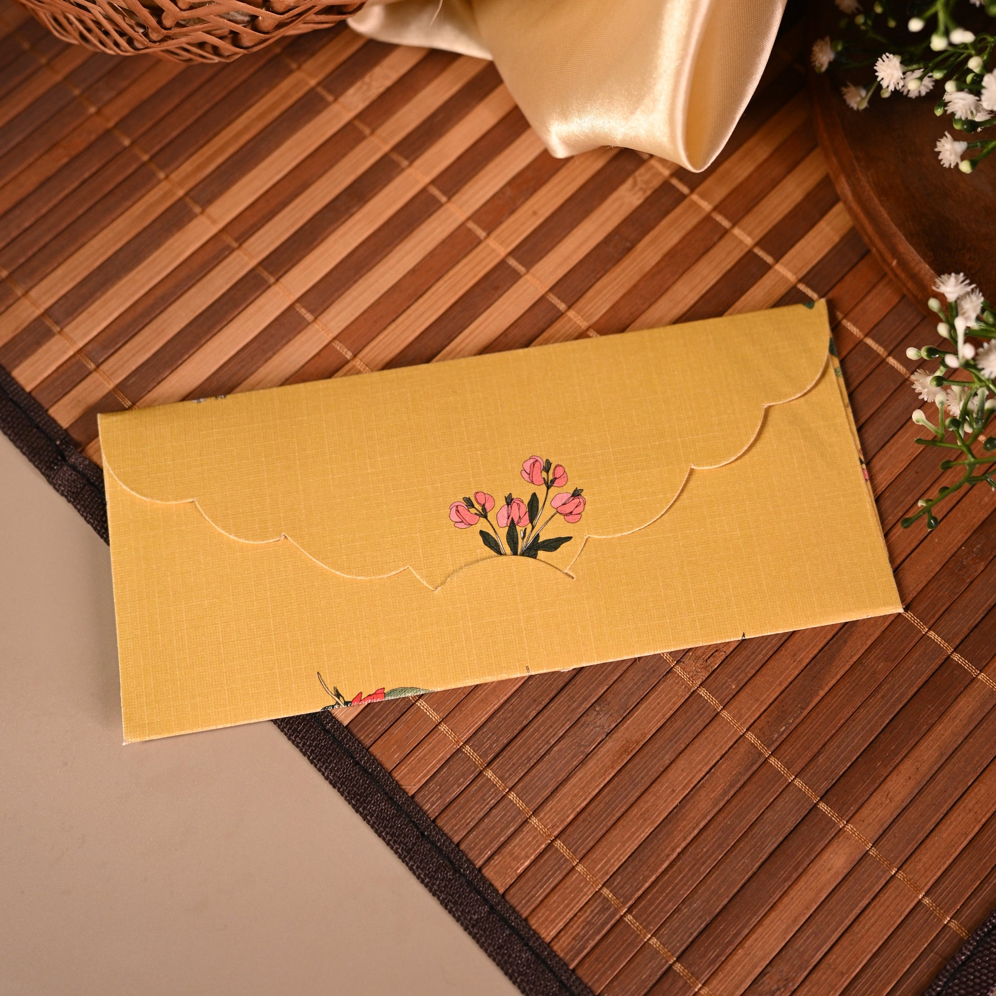printed pink floral pattern on a yellow background