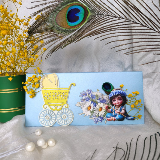 powder blue envelope showcasing a baby krishna, a pram and some flowers
