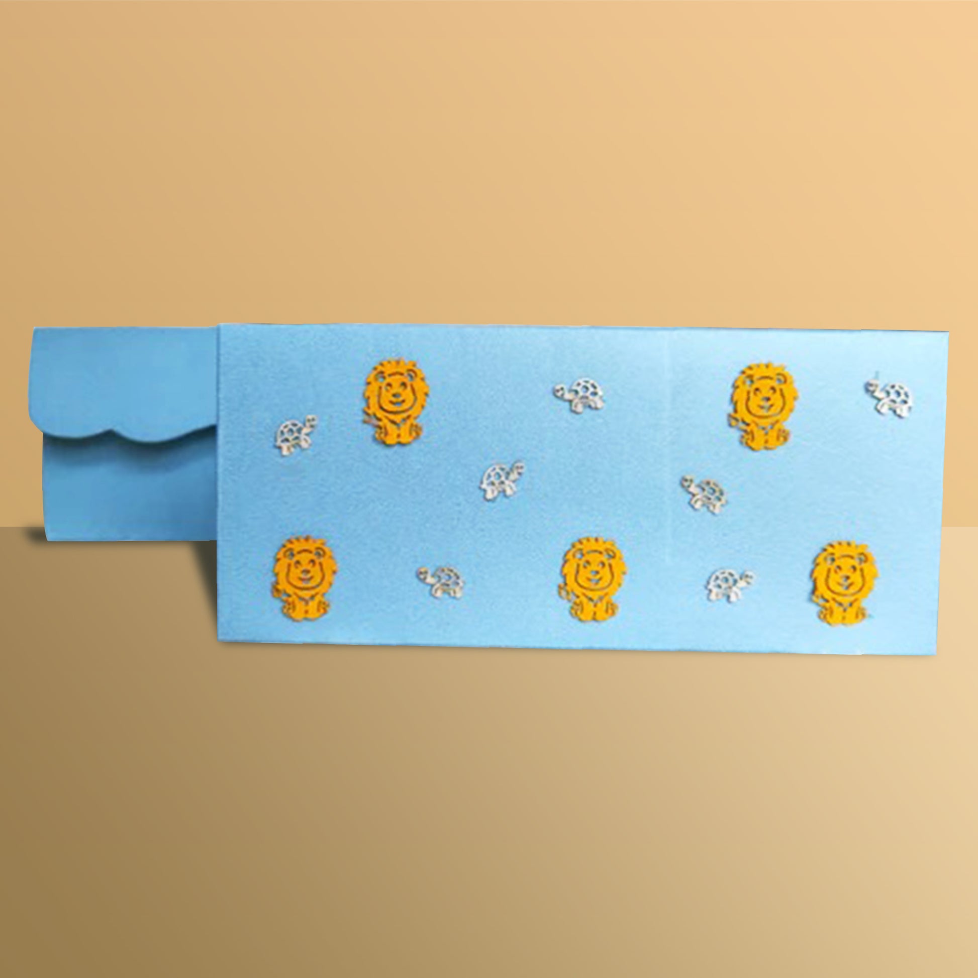 yellow lion illustrations and turtle cutouts on blue texture paper envelope