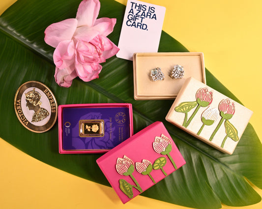 Coin boxes inspired by pichwai art featuring lotus design, contains space for ginni