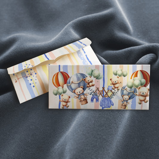 Two printed envelopes with teddy bear and parachute designs 