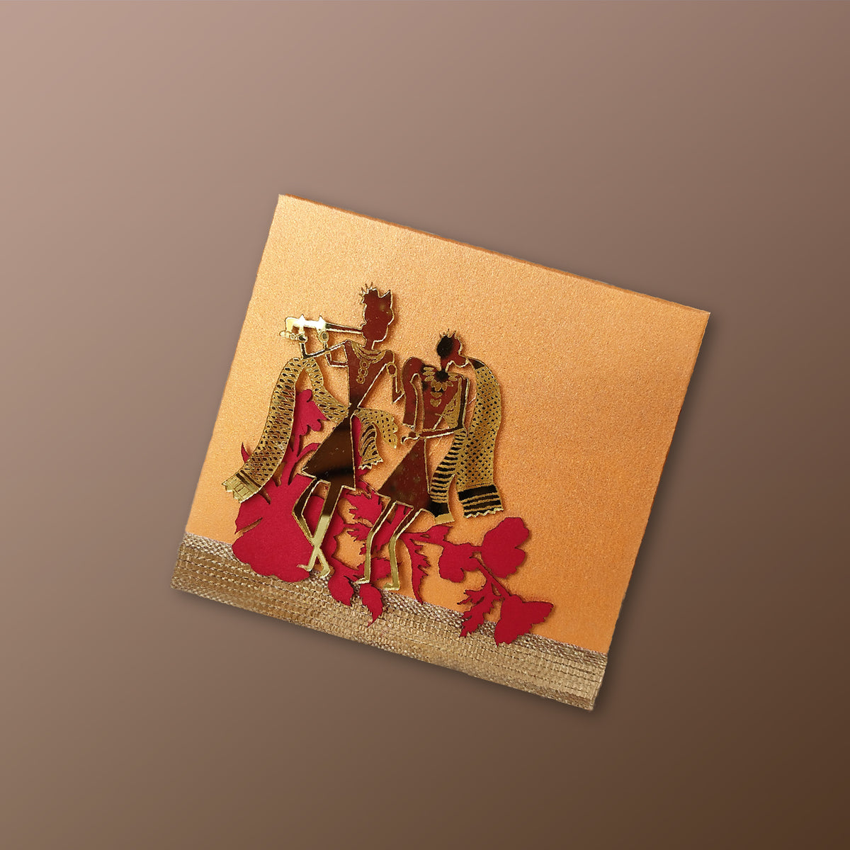 Decorative card with cut-out figures on a brown background