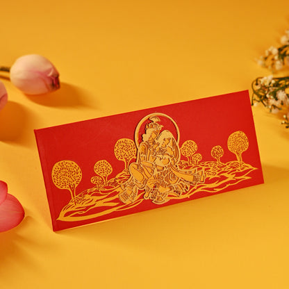 A set of laser-cut money envelopes with a Radha Krishna motif, in red, gold, and silver colours